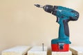 Electric cordless screwdriver and one close-up Royalty Free Stock Photo