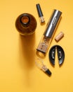 Electric corkscrew made of gray metal. Bottle, aerator, vacuum cork for wine. On a yellow background. Isolated. Hard light and Royalty Free Stock Photo