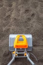 Electric cultivator cultivates soil in vegetable garden Royalty Free Stock Photo