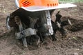 Electric cultivator for cultivating soil Royalty Free Stock Photo