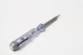 Electric current test tool or voltage tester in the form of a screwdriver. Royalty Free Stock Photo