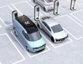 Electric delivery minivan and silver sedan charging at charging station