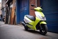 electric delivery scooter with green branding parked in alleyway Royalty Free Stock Photo