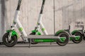 Electric E scooter , escooter or e-scooter of the ride sharing company LIME on sidewalk Royalty Free Stock Photo