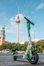 Electric E scooter , escooter or e-scooter of the ride sharing company LIME on sidewalk Royalty Free Stock Photo