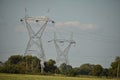 Electric energy tower in farm Royalty Free Stock Photo