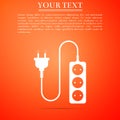 Electric extension cord icon isolated on orange background. Power plug socket. Flat design. Vector Royalty Free Stock Photo