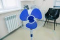 Electric fan in hospital ward for doctor in hot season of year, closeup view.