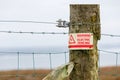 Electric fence danger warning sign Royalty Free Stock Photo