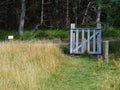 Electric fenced area and cattle gate farm animals