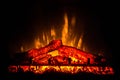 Electric fireplace with orange and yellow fire flame Royalty Free Stock Photo