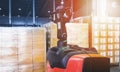 Electric Forklift Pallet Jack with Package Boxes in Storage Warehouse. Cargo Shipment Storehouse, Shipping Warehouse Logistics Royalty Free Stock Photo