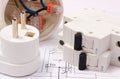 Electric fuse and plug, electrical box on construction drawing Royalty Free Stock Photo