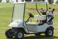 Electric golf buggy on a fairway Royalty Free Stock Photo