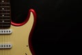 Electric guitar body isolated on black background. Entertainment and music concept. Royalty Free Stock Photo