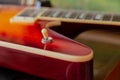 Electric guitar body and neck detail on wooden background vintage look Royalty Free Stock Photo