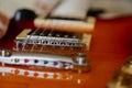 Electric guitar body and neck detail on wooden background vintage look Royalty Free Stock Photo