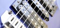 Electric guitar bridge, strings and pickup. Detail close-up view of guitar pickup in blue Royalty Free Stock Photo