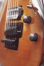 Electric guitar close-up with soft focus of brown color, Floyd Rose