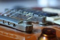 Electric guitar Fretboard closeup macro slider shot. Guitar pegs on a six-string Royalty Free Stock Photo