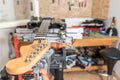 Electric guitar in handmade domestic music instrument service repair made in garage Royalty Free Stock Photo