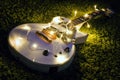 Electric guitar with lighted garland Royalty Free Stock Photo