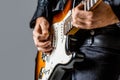 Electric guitar. Man playing guitar. Closeup hand playing guitar Royalty Free Stock Photo