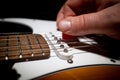 electric guitar is played with a red pick Royalty Free Stock Photo