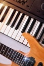 Electric guitar and synthesizer top view vertical composition Royalty Free Stock Photo