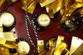 Burgundy electric guitar in Christmas tinsel