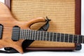 An electric guitar and a vintage looking combo amp shot against a white background Royalty Free Stock Photo