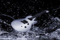 Electric guitar in water Royalty Free Stock Photo