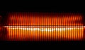 Electric halogen wall heater abstract close up shot