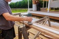 electric hand held power fixed base router with work gloves on wood Royalty Free Stock Photo