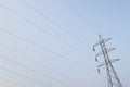 Electric high voltage post with sky background - High voltage po Royalty Free Stock Photo