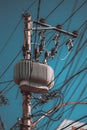 Electric high-voltage power pole with the transformer unit Royalty Free Stock Photo