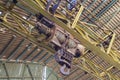 Electric hoist hanging from the ceiling of an industrial building in the mines of Portman, Murcia, Spain