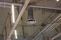 Electric industrial hood on a metal ceiling