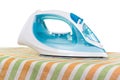Electric iron with steam on striped cloth, on white