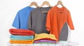 Electric iron and tidy clothes on the iron board Royalty Free Stock Photo