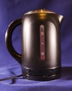 Electric kettle, measured mark water level red color - a boiling sign Royalty Free Stock Photo