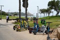 Electric kick scooter parked on rental station