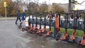 Electric Kick Scooter In Sharing Parking Lot.