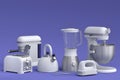 Electric kitchen appliances and utensils for making breakfast on violet