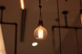 A electric lamp lighting . modern and vintage style , interior ceiling hanging light bulb decorate at room Royalty Free Stock Photo