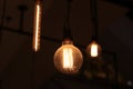 A electric lamp lighting . modern and vintage style , interior ceiling hanging light bulb decorate at room Royalty Free Stock Photo