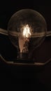 An electric lamp lit in the dark