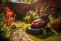 electric lawn mower charging in a sunny garden