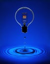 Electric light bulb with blue ripples Royalty Free Stock Photo