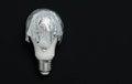 Electric light bulb on a dark background Royalty Free Stock Photo